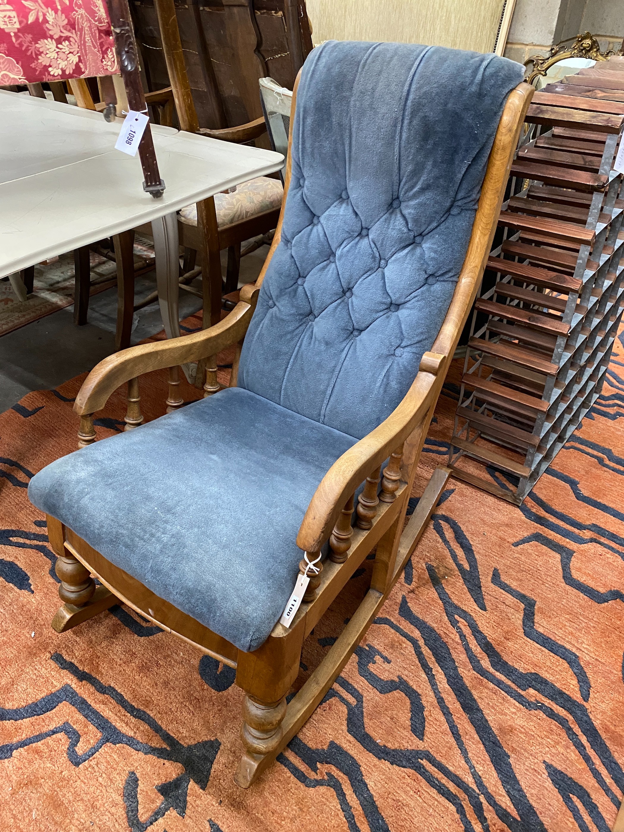 A Victorian upholstered mahogany rocking chair, height 96cm